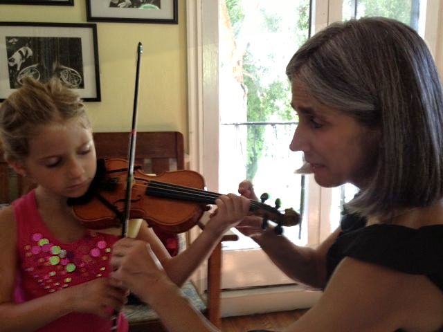 Beverly Hills violin student Eva learns proper violin technique during her lesson with Constance.