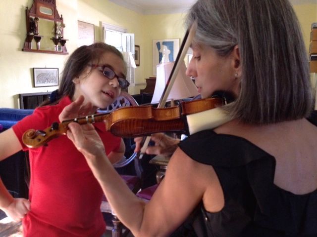 Serena loves learning violin from Constance, shown here during a lesson in her Beverly Hills violin studio.
