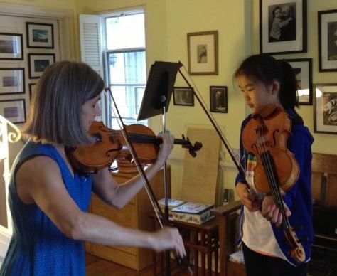 Beverly Hills violin teacher Constance Meyer gives a violin lesson to student Ella.