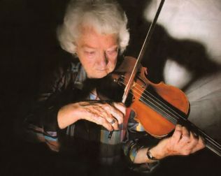 Violinist Irma Neumann has worked on countless films, TV shows and commercials. Neumann began participating in scoring sessions nearly 60 years ago. In 1953, she played for "Titanic" under composer Sol Kaplan and in 1997 for "Titanic," scored by James Horner. She has played for Alex North, Bernard Herrmann, Dmitri Tiomkin, Henry Mancini and Randy Newman, on films ranging from "Butch Cassidy and the Sundance Kid" to "M*A*S*H" to "Cleopatra." Her recent credits include the "The Matrix Revolutions," the coming HBO adaptation of "Angels in America" and the soon-to-be-released "The Cat in the Hat."